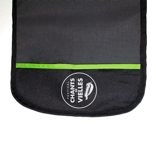 A black and green bag with the Placemat Eco-Friendly logo on it.